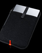 The Brown Buffalo laptop sleeve shown in a lifestyle product photograph.