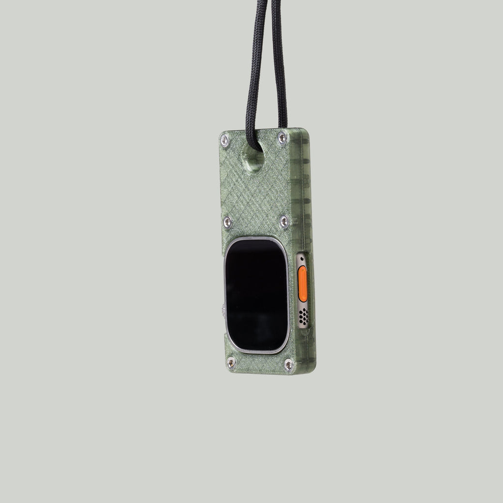 Olive green miniPhone Ultra case holding an Apple Watch Ultra, suspended from its black cord.